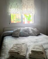 Posteľ alebo postele v izbe v ubytovaní Apto. planta baja y cochera barrio San Basilio
