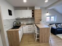 Kuchyňa alebo kuchynka v ubytovaní Apartmani Nova