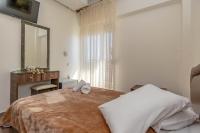 Postel nebo postele na pokoji v ubytování Hotel Alkyon