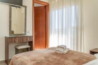 Postel nebo postele na pokoji v ubytování Hotel Alkyon