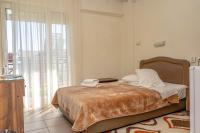 Postel nebo postele na pokoji v ubytování Hotel Alkyon