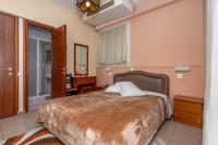 Postel nebo postele na pokoji v ubytování Hotel Alkyon