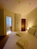 Posteľ alebo postele v izbe v ubytovaní Vila Zrina - Apartmani