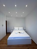 Posteľ alebo postele v izbe v ubytovaní Vila Zrina - Apartmani