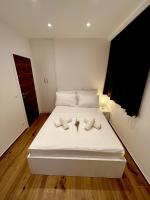 Posteľ alebo postele v izbe v ubytovaní Vila Zrina - Apartmani