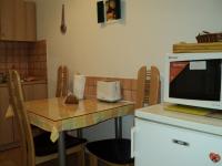 Kuchyňa alebo kuchynka v ubytovaní Apartment Horvat