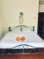 Postel nebo postele na pokoji v ubytování TAMONWAN HOUSE Koh Tao