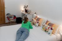A bed or beds in a room at Hostal Santa Cruz
