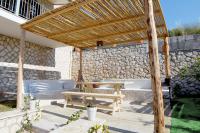 Patio alebo iná vonkajšia časť ubytovania Manoir Dennise Villa