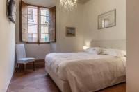 Posteľ alebo postele v izbe v ubytovaní Casa Maghinardo