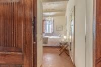Posteľ alebo postele v izbe v ubytovaní Casa Maghinardo