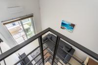 TV a/nebo společenská místnost v ubytování Sunrise Apartment