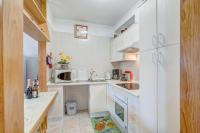 Kuchyň nebo kuchyňský kout v ubytování Apartamento Atlantic View