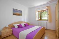 Postel nebo postele na pokoji v ubytování Ripenda Apartments