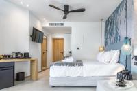Posteľ alebo postele v izbe v ubytovaní SAVUS Boutique Hotel