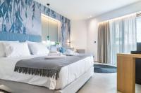 Posteľ alebo postele v izbe v ubytovaní SAVUS Boutique Hotel
