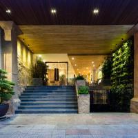 a set of stairs leading to a store at night at Silverland Yen Hotel in Ho Chi Minh City