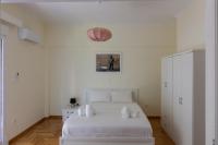 Posteľ alebo postele v izbe v ubytovaní Bright and Spacious 2-bedrooms Apartment in Athens