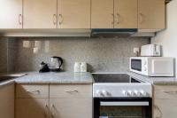 Kuchyňa alebo kuchynka v ubytovaní Bright and Spacious 2-bedrooms Apartment in Athens
