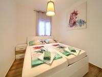 Postel nebo postele na pokoji v ubytování Apartment Ankica