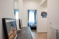 Televízia a/alebo spoločenská miestnosť v ubytovaní Maqueda House