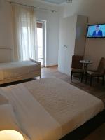 A bed or beds in a room at La Dimora del Conte