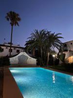 Bazén v ubytování Apartamento Urb Oasis Park II Denia, las Marinas nebo v jeho okolí