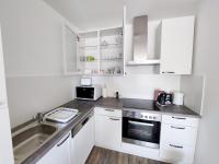 Kuchnia lub aneks kuchenny w obiekcie Juhar Apartman