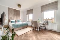 Posteľ alebo postele v izbe v ubytovaní MARGI Daphne LUX BEAUTI STUDIO