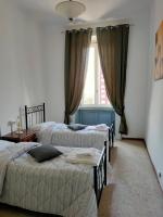 Posteľ alebo postele v izbe v ubytovaní Apartment Nido Stazione