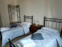 Posteľ alebo postele v izbe v ubytovaní Apartment Nido Stazione