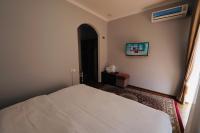 Samarkand Travelにあるベッド