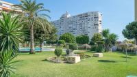 Zahrada ubytování Apartamento La Torre 1337 Precioso, moderno y con piscina