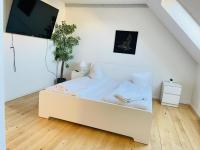 Postel nebo postele na pokoji v ubytování aday - Reberbansgade Apartment Suite