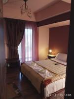 Łóżko lub łóżka w pokoju w obiekcie Guesthouse Kastania Korakis