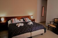 Łóżko lub łóżka w pokoju w obiekcie Hotel Borgo Antico