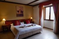 Łóżko lub łóżka w pokoju w obiekcie Hotel Borgo Antico