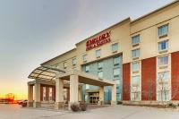 a hotel building with a sign on the front of it at Drury Inn &amp; Suites Sikeston in Sikeston