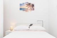 Posteľ alebo postele v izbe v ubytovaní Apartment Paradise