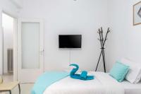Posteľ alebo postele v izbe v ubytovaní Koukaki Olympiou Apartment