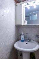 Kúpeľňa v ubytovaní Koukaki Olympiou Apartment