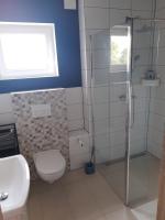 Łazienka w obiekcie Lazurowe Apartamenty
