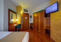 Posteľ alebo postele v izbe v ubytovaní Hotel Raffaello