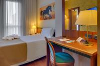Posteľ alebo postele v izbe v ubytovaní Hotel Raffaello