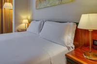 Posteľ alebo postele v izbe v ubytovaní Hotel Raffaello