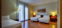 Posteľ alebo postele v izbe v ubytovaní Hotel Raffaello
