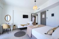 Posteľ alebo postele v izbe v ubytovaní ALMYRA seafront residence