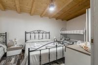 A bed or beds in a room at "The Cottage"with sea view, parking & wifi