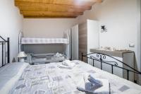 A bed or beds in a room at "The Cottage"with sea view, parking & wifi