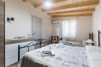 A bed or beds in a room at "The Cottage"with sea view, parking & wifi